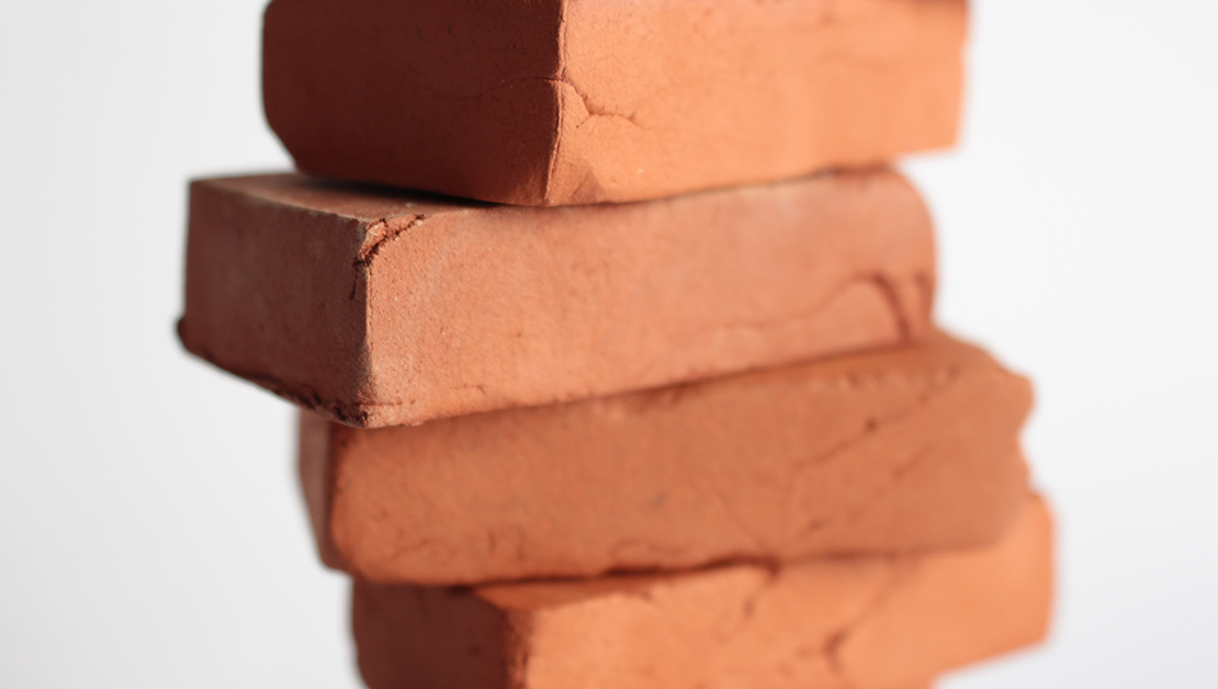 Ceramic Brick Architecture Competition statue imitating a pile of bricks
